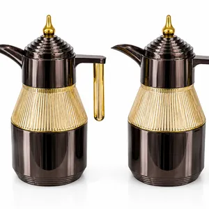 gilded black and gold vacuum insulated coffee and tea carafes set of 2