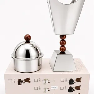 shiny incense burner set featuring a polished nickel