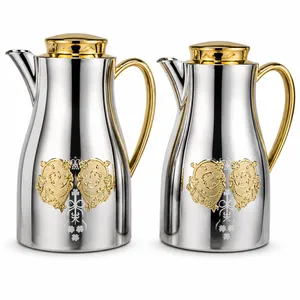 thermos set  a metallic silver finish with gold
