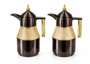 gilded black and gold vacuum insulated coffee and tea carafes set of 2